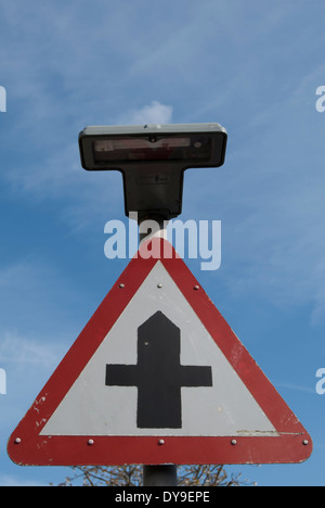 british road sign indicating a crossroads junction ahead, in barnes, southwest london, engand Stock Photo
