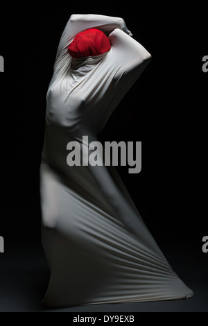 Idea of self-torture - faceless female silhouette Stock Photo