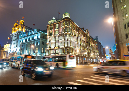 From right: Swatch Art Peace Hotel, Chartered Bank Bulding and North China Daily News Building on The Bund in Shanghai, China Stock Photo