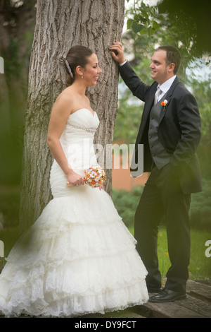Newly married couple smile happily Stock Photo