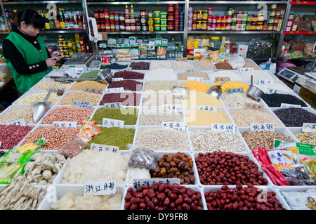 small grocery shop with seeds at food market on Old City of Shanghai (Nanshi), China Stock Photo