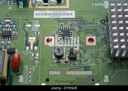 inside a broadband router showing circuit board. Electronic components Stock Photo