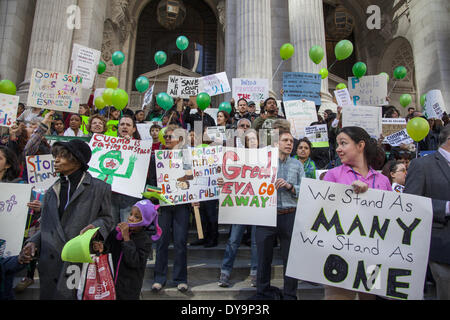 New York City, USA. 10th April, 2014.  Public school parents, students, community members & teachers protest Gov. Cuomo & state legislature shifting needed funds & resources to charter schools which represent only 3% of students, especially that Wall Street and the corporate sector are partially  funding them with an eye on profits. Some see charters as a capitalist move towards privatization endangering public education. Stock Photo
