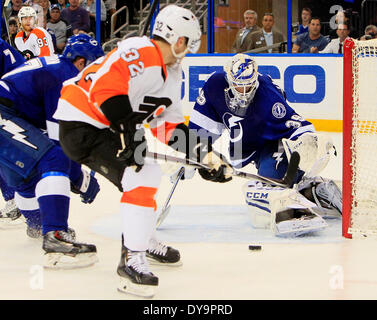 Tampa, Florida, USA. 10th Apr, 2014. DIRK SHADD | Times .Tampa Bay Lightning goalie Anders Lindback (39) works ro make a save with Philadelphia Flyers defenseman Mark Streit (32) pressing during second period action at the Tampa Bay Times Forum in Tampa Thursday evening (04/10/14) © Dirk Shadd/Tampa Bay Times/ZUMAPRESS.com/Alamy Live News Stock Photo