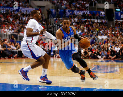 Los Angeles, California, USA. 09th Apr, 2013. Oklahoma City Thunder guard Russell Westbrook drives by Los Angeles Clippers guard Chris Paul during the NBA basketball game between the Oklahoma City Thunder and the Los Angeles Clippers at Staples Center in Los Angeles, California. Charles Baus/CSM/Alamy Live News Stock Photo