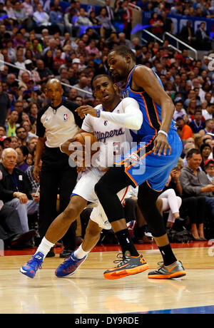 Los Angeles, California, USA. 09th Apr, 2013. Los Angeles Clippers guard Chris Paul drives by Oklahoma City Thunder forward Kevin Durant during the NBA basketball game between the Oklahoma City Thunder and the Los Angeles Clippers at Staples Center in Los Angeles, California. Charles Baus/CSM/Alamy Live News Stock Photo