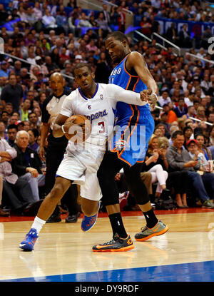 Los Angeles, California, USA. 09th Apr, 2013. Los Angeles Clippers guard Chris Paul drives by Oklahoma City Thunder forward Kevin Durant during the NBA basketball game between the Oklahoma City Thunder and the Los Angeles Clippers at Staples Center in Los Angeles, California. Charles Baus/CSM/Alamy Live News Stock Photo