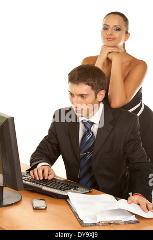 Two contemporary businesspeople discussing while working at the computer Isolated on white background Stock Photo