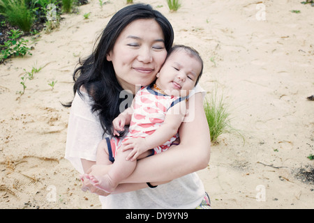 Mother with infant son outdoors, portrait Stock Photo
