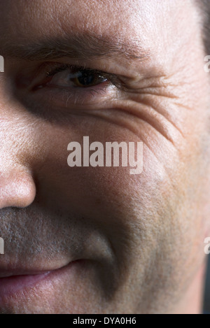 Man's face, smiling, close-up Stock Photo