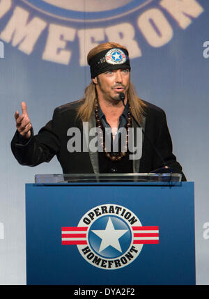 Singer Bret Michaels speaks during the Operation Homefront 6th Annual Military Child of the Year Awards Dinner at the Crystal Gateway Marriott April 10, 2014 in Arlington, Virginia. The Military Child of the Year Award is presented to the military child from each service who demonstrates resiliency, leadership, and achievement. Stock Photo