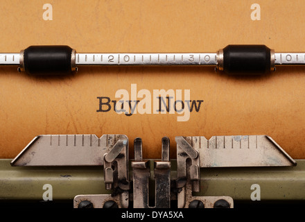 Buy now text on typewriter Stock Photo
