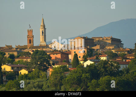 Europe mediterranean italian Italy Tuscany Siena Province Pienza village city hillside stucco minaret spire last light sunse Stock Photo