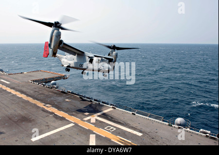 A US Marine MV-22 Osprey tiltrotor aircraft takes off from the flight deck of the amphibious assault ship USS Bonhomme Richard April 8, 2014 in the East China Sea.