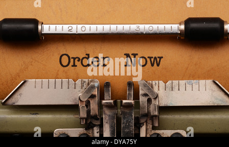 Order now text on typewriter Stock Photo