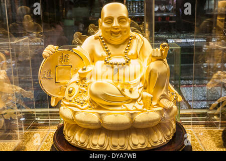 China, Macau, Gold and Jewellery Shop Window, Display of Gold Buddha Statue Stock Photo