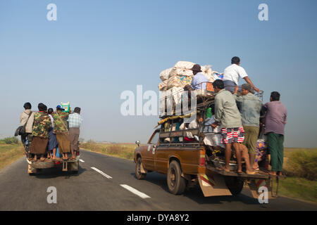 Local transport, Mon, Myanmar, Burma, Asia, dangerous, people, traffic, truck, overloaded Stock Photo