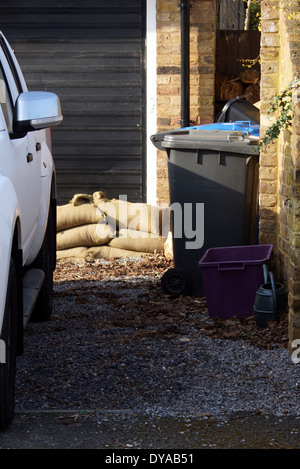 Sandbags everywhere in Datchet's, flood aftermath  On Thames riverside; near Windsor castle in Berkshire,  England, UK Stock Photo