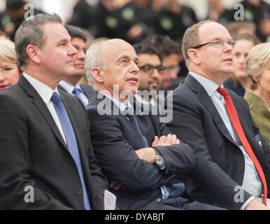 Payerne, Switzerland. 09th Apr, 2014. Prince Abert II of Monaco (right) and Ueli Maurer, Swiss minister of defence (middle), watch the unveiling of Solar Impulse 2 in . Credit:  Erik Tham/Alamy Live News Stock Photo