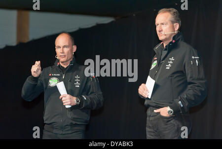 Payerne, Switzerland. 09th Apr, 2014. Bertrand Piccard (left) and Andre Borschberg at the unveiling of 'Solar Impulse 2', a spectacular solar powered aircraft made to fly around the world without any fuel. Credit:  Erik Tham/Alamy Live News Stock Photo