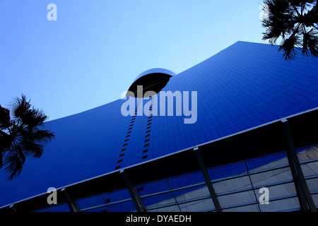 Looking up at the modern architecture of theWorld Trade Center made of blue glass with curved lines, Mexico City, Mexico Stock Photo