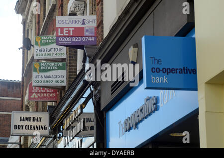 London, 11 April 2014, Co-op bank apologises for £ 1.3 billion loss for 2014 to it's 4.7 million customers after discovery of £1.5 billion pound black hole. Stock Photo