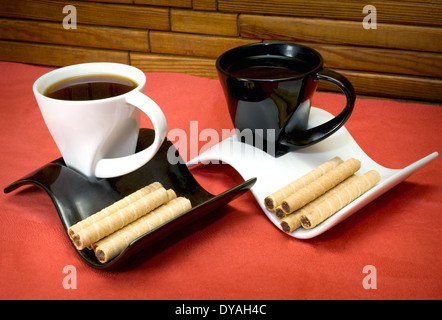 two cups of coffee and wafer sticks with chocolate Stock Photo