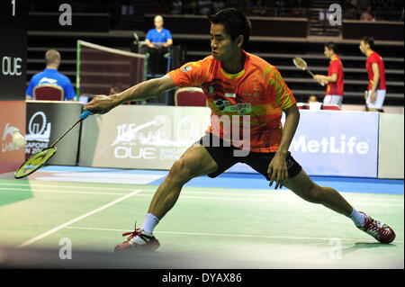 Singapore. 12th Apr, 2014. Simon Santoso of Indonesia competes during the men's singles semi-final match at the OUE Singapore Open badminton tournament against Du Pengyu of China in Singapore, April 12, 2014. Simon Santoso won 2-1. Credit:  Then Chih Wey/Xinhua/Alamy Live News Stock Photo