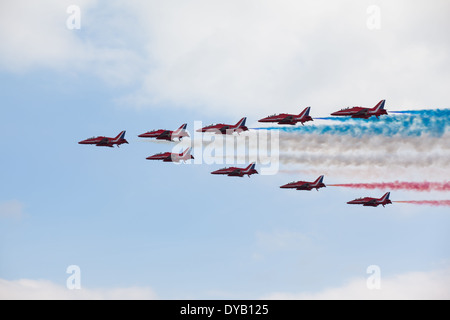 Red Arrows display team performing at Bournemouth Air Festival 2013, Dorset, UK. Stock Photo