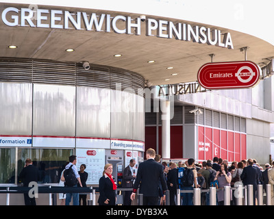 Passengers queuing to buy tickets for the Emirates Air-Line cable cars at the Greenwich Peninsula station in south east London. Stock Photo