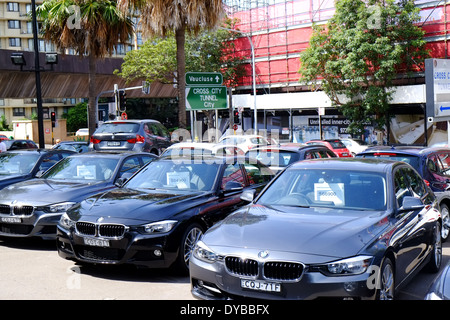 BMW cars for sale at a sydney dealership in australia Stock Photo