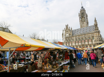 Antique market in front of the famous Town Hall of the city of Middelburg, capital of Zeeland province, the Netherlands. Stock Photo
