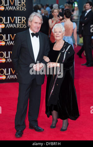 London, UK, 13th Apr, 2014. Actress Dame Judi Dench and David Mills arrive at the Laurence Olivier Awards held at the Royal Opera House in Central London, on Sunday April 13, 2014. Credit:  Heloise/Alamy Live News Stock Photo