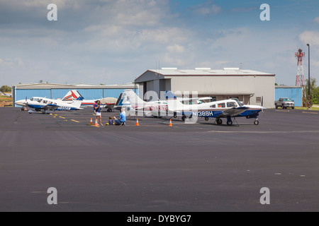 Private airplanes at Brenham Municipal Airport in Brenham, Texas. Stock Photo