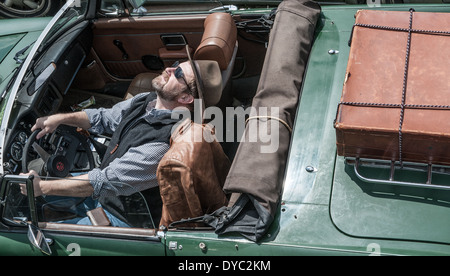Man in convertible sports car Stock Photo