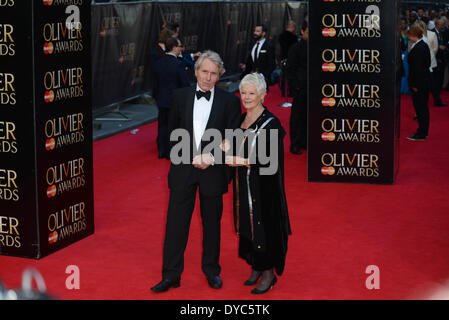 LONDON, ENGLAND - APRIL 13: David Mills; Dame Judi Dench attends the Laurence Olivier Awards at The Royal Opera House on April 13, 2014 in London, England. Credit:  See Li/Alamy Live News Stock Photo