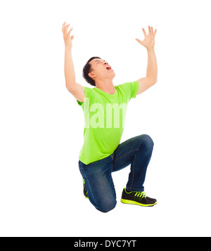 Young man raise hands and screaming Stock Photo