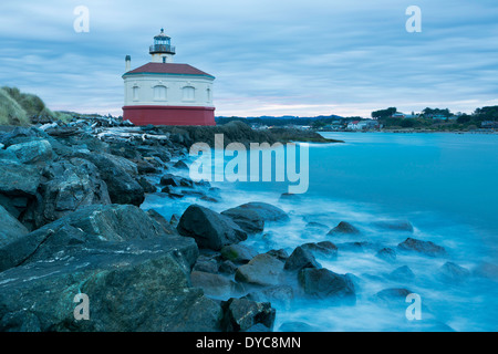 The Coquille River Lighthouse along the Coquille River in Bandon, Oregon at sunrise. USA Stock Photo