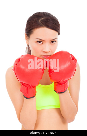 Boxing fitness woman concentrating and protecting pose Stock Photo