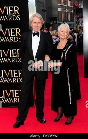 London, UK . 13th Apr, 2014. David Mills & Dame Judi Dench attends The Laurence Olivier Awards at The Royal Opera House 13-4-2014 Credit:  Peter Phillips/Alamy Live News Stock Photo