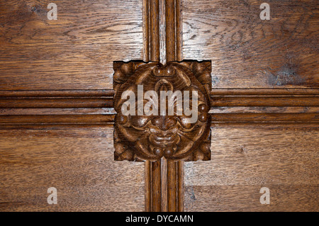 A ceiling boss carved with the face of a Green Man in All Saints church, Upper Sheringham, Norfolk. Stock Photo