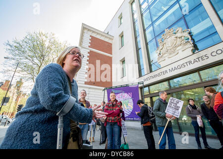 London, UK . 14th Apr, 2014. Amy Jowett, anti-fascist protester whose leg was broken by the police on 1st June 2013 during a counter-demonstration against the BNP, joins the solidarity protest for the ‘Antifascist Five’ demonstrators outside Westminster Magistrates Court, London. Credit:  Guy Corbishley/Alamy Live News Stock Photo