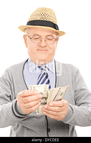 Senior gentleman counting money Stock Photo