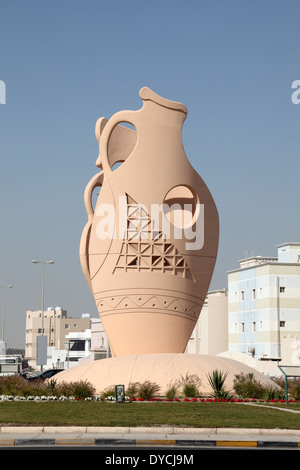 Amphora monument in a roundabout in A'Ali pottery village. Bahrain, Middle East Stock Photo