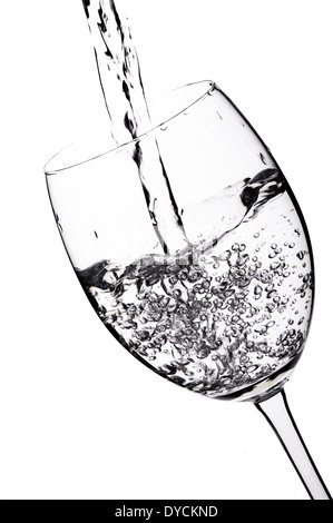 Water being poured into a glass. Stock Photo