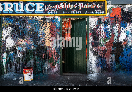 W. B. Bruce (Ship Painters) Ltd office. Painterly daub brush strokes & test area paint streaks at the harbour in Fraserburgh, Scotland, UK Stock Photo