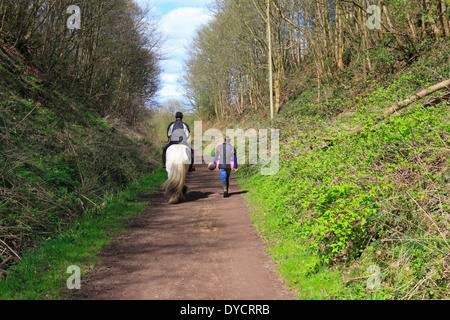 Horse rider and walker on the Trans Pennine Trail, Upper Don Trail, Wortley, Barnsley, South Yorkshire, England, UK. Stock Photo
