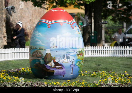 Zagreb, Croatia. 14th Apr, 2014. Photo taken on April 14, 2014 shows a huge hand-painted Easter egg on display near the Zagreb Cathedral on Kaptol in Zagreb, capital of Croatia, April 14, 2014. Several Easter eggs, painted in Croatian Naive art style by artists from the Koprivnica-Krizevci County, were set up in downtown Zagreb to celebrate Easter. © Miso Lisanin/Xinhua/Alamy Live News Stock Photo