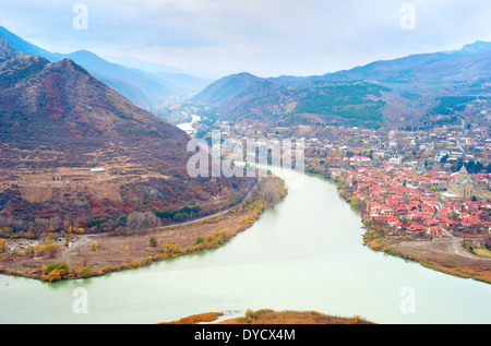 Old georgian town Mtskheta and Caucasus mountain range, Georgia Stock Photo