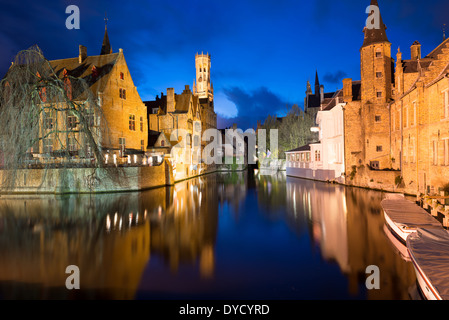 BRUGES, Belgium - Sometimes called 'The Venice of the North,' the historic Flemish city of Bruges has canals running through the old town. Before the water access became silted up, Bruges was a major commercial port. Medieval architecture and serene canals shape the cityscape of Bruges, often referred to as 'The Venice of the North'. As a UNESCO World Heritage city, Bruges offers visitors a journey into Europe's past, with its well-preserved buildings and cobblestone streets reflecting the city's rich history. Stock Photo